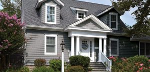 A beautiful American home with gray CertainTeed siding